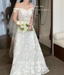 Oloey utsökt full spets Korea bröllopsklänningar mössa ärmar golvlängd brudklänningar korsett tillbaka elegant fotograferingsart