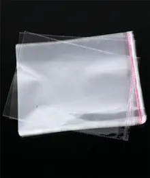 100pcsLots Resealable Cellophane OPP Poly Bags Thick Clear Chlothes Clothing Package Storage Bag Envelope Gift Wrap9907167