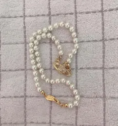 Высококачественное калочное спутниковое ожерелье Столового ожерелья для Женского орбита Жемчужно -цепочка Модные украшения для подарков 9704047
