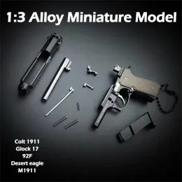 Keychains 1pc New Antistress 장난감 금속 권총 건 Keychain 미니어처 모델 1 : 3 Beretta 92f Colt 1911 Glock 17 생일 선물 남성용 생일 선물