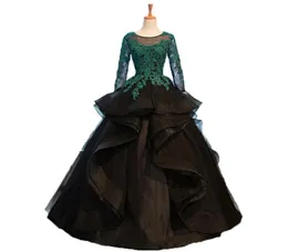 Unikalne czarne koronkowe sukienki Quinceanera z długim rękawem cekinowa fali z paliwową suknię balową Słodka 15 suknie