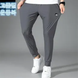 Pantaloni da golf pantaloni da uomo estate in ghiaccio elevato elastico pantaloni ultratina casual rapina in corsa da golf indossare pantaloni della tuta più 5xl