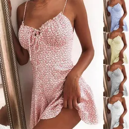 Kvinnor Summer Spaghetti Strap Floral Print Tie Front Mini Dress Sexig klänning Patry Beach Style All-Match Floral Kjol 240412