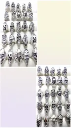كامل الكثافة 100pcs الأنماط Top Mix Skull Rings هيكل عظمي المجوهرات Men039s Gift Party لصالح Men Rings Rings Man Jewelry Brand 2724284