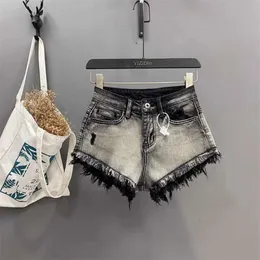 Sexy a-line schwarze Super Shorts für heißes Mädchen modische schwere Industrie Quasten zerlumpte Kanten Stretch Hips Cowboy Hot Hosen Trendy Trendy