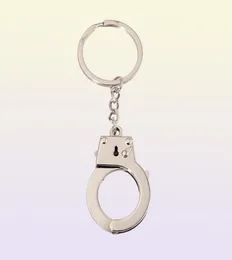 محاكاة الأصفاد المعدنية مفتاح مفتاح المفتاح الافتتاحية للزجاجة الرجال والنساء keychain114419