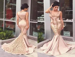 2021 Nuovi abiti da sera in pizzo dorato rosa blush Appliques perle sirena abiti da sera arabi formali abiti da ballo senza maniche p3942599