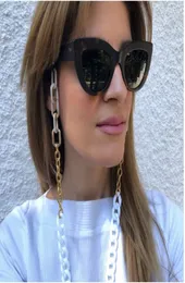 Brillenkette weiße Acrylmärchen mit Goldfarbe plattiert Silikonschleifen Eimerhalter Retainer Sonnenbrille Accessoire für Frauen NEC8333344