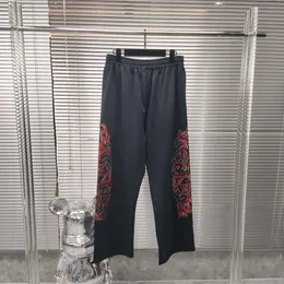 Högkvalitativ designerkläder High-end Paris Offshore Flame Tryckt Mens Womens Sanitary Pants