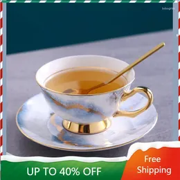 Tazze di piattini osseo in porcellana di tazza di caffè decorazione oro minimalista oro ceramico bianco set di tè in inglese set di porcelana tavoli da tavolo 50bd