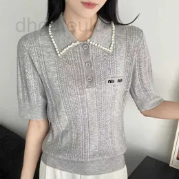 Marca de designer de camisetas femininas 24 no início da primavera nova elegante pérola pólo pescoço lã jacquard suéter de malha curta para mulheres je0j