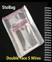 Stobag 100pcs klarer selbstklebender Cello -Cellophan -Beutel Selbstversiegelte Plastiktüten Kleidung Schmuck Verpackung Candy Oppes wiederverschließbar y9618516