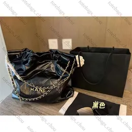 Designer Garbage bag New small fragrant wind bright oil wax face chain bucket bag letter gold coin Tote Bag Shoulder Messenger Chain Bag female garbage bag