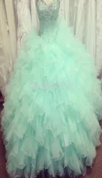 2019 New Sweetheart Crystals Quinceanera Dresses Sweet Sixteen Sequined Adrapless Ball Gowns Pärlade prinsessor Prom -klänningar Custom Mad9860527