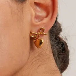 Exquisites Edelstahl Herz Dangle Ohrringe für Frauen Gold Farbbogenknoten Piercing Mode Schmuck Großhandel 240410