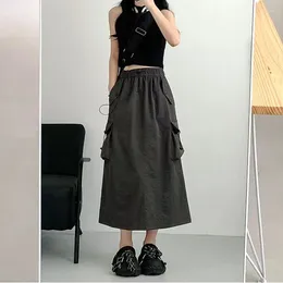 Saias Dayifun Lady Mid Length Dress Vestido de roupas femininas Canda alta A-line Pocket Panel Design Retro cinza primavera verão 2024