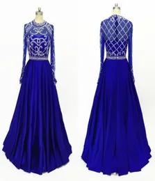 Fantastisk Royal Blue Long Sleeve Pageant Prom -klänningar 2022 High Neck Illusion Crystal Pärled Sequin A Line Satin Hollow Back Evenin7022135