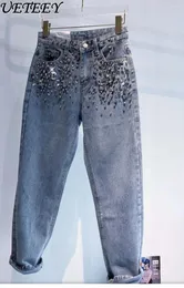 Jeans femininos Mercadorias européias pesadas indústria artesanal contas de diamante completo Flash Flash Casual Calças de cintura alta alta