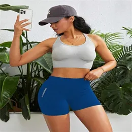 Shorts femininos nylon ostenta uma cintura alta de moda curta e suor absorvendo as meias atléticas de elasticidade yoga