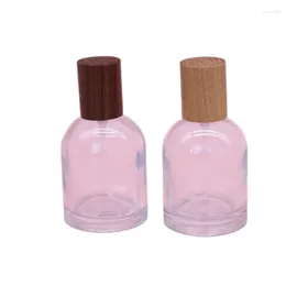 Garrafas de armazenamento 30ml 50ml 100ml garrafa de perfume árabe redonda vazia vidro clear atomizador de madeira tampa de pérola Fragrância de spray de névoa cosmética