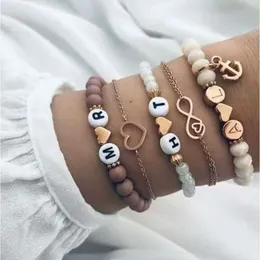 Fünf-teiliges Mehrschicht-Set mit personalisiertem hohlen geometrischen Boot Ankeranhänger, Liebesbracelet