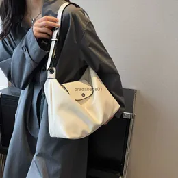 Designerväska Longxiang Bag Womens Ny axel Enkel och mångsidig pendling med stor kapacitet Hobo Fashion Student Classroom