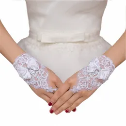 Elegan koronkowe krótkie rękawiczki ślubne Inkrustowne dhineste Bowknot Slim Bridal Fingerl Rękawiczki białe suknia ślubna z kości słoniowej Acries N9KZ#