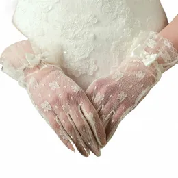 Eleganckie koronki z kości słoniowej krótkie damskie rękawiczki ślubne Cosplay Party Gloves Wedding Acories z kokardą długość nadgarstka Rękawiczki ślubne V0MD#