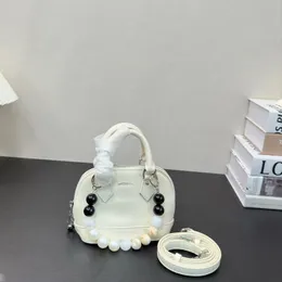 Новые модели портативные пакеты Shell Designer роскошная жемчужная мешка кроссбаута для женской ретро -рюкзак для модных модных модных