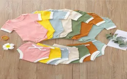 Roupos de designer de bebê meninos roupas de verão conjunto de doces Artigo Poço de algodão Meninas Triângulo Triângulo 2Pieces Conjuntos Bodysu3904925