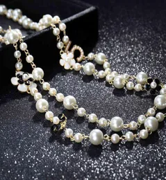 Wysokiej jakości kobiety długie wisiorki warstwowe kołniery naszyjnika perłowe de moda numer 5 kwiatowy biżuteria 281N8531094