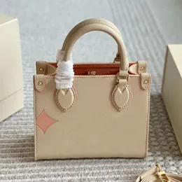 På handväskdesignern Tote Mini Shoulder Bag Beach Bag Fashion Letter Printing Cowhide äkta läder avtagbar rem av hög kvalitet kvinnor totes