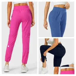 Yoga outfit lu-1028 byxa blixtlås byxor elastiska dstring andningsbar fritid sport kvinnlig droppleverans utomhus fitness leveranser dhrnk