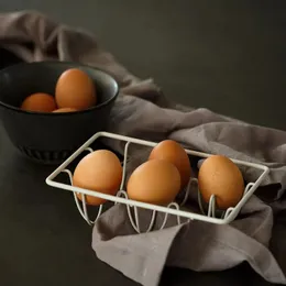 A Rack de ovo Europeu Criativo Nórdico Creative uma solução conveniente e elegante para armazenamento de ovos de cozinha