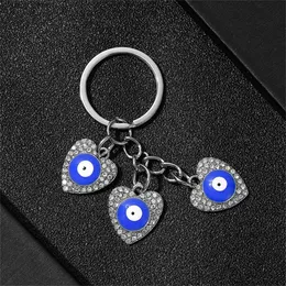 Keychains Lanyards 레트로 패션 파란색 사악한 눈 키 체인 여성 럭키 나비 러브 하트 불 다리 핸드 매력 키 링 키 홀더 보석 Y240417