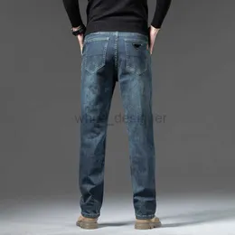 Projektanści dżinsy dla męskich wiosny 2024 nostalgiczny niebieski biznes dojazdowy sprężyste spodnie dżinsowe proste nogi na wiosenne pary jesienne luksusowe odzież męska