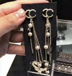 2024 earrings S925 Silver needle foreign air texture temperament fringe chain long pearl string earrings female fashion temperament tall on