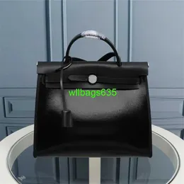 Bola de pano de luxo confiável ky pano bolsa 2024 verão nova tela impermeabilizada com bolsa de bolsa de bolsa de bolsa de couro para bolsa de bolsa de splicing blip b tem logotipo hbjv95