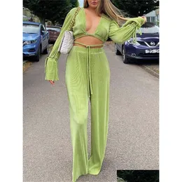 Kvinnors tvåbitar byxor Kvinnor WSEVYPO GRÖN PLESKED 2 -stycken kostym Set Solid Flare Lång ärm Bandage Crop Tops Wide Ben Loose outfi Dhchu