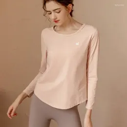 Camicie attive al copertina delle donne a maniche lunghe che corrono sports ombrellone che abbelli di abbonamento a corto di fitness yoga fuori