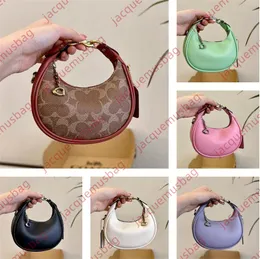 Women Coa Bag Bag Jonie Handbag Designer Half-Moon Tote Crescent Moon Clutch Wallet Top Conditer Crossbody Bags Hobo Hobo Messenger Blage Bage