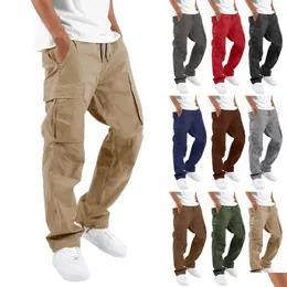 Calça de calça masculina calça de carga para homens de comprimento de comprimento cor sólido solto mti-bolso dstring bolsões masculino 3xl 240112 Drop entrega de vestuário pano de vestuário dhd4p