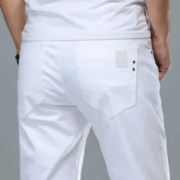 Calça para quatro estações masculinas brancas jeans moda casual estilo clássico slim confortável calça jeans da marca masculina calça esticada avançada