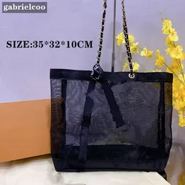 Designerin für schwarze Mesh Umhängetasche Frauen Mode -Einkaufstasche Klassiker Buchstaben Logo gedruckt transparent Waschbag Ribbon Dekoration Strand tragbare Umwelttasche