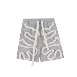 Linia Flocking Shorts Boys Ins Street Fashion Lose pięciopunktowe spodnie Letni projekt Sense Sense Personalized Knee Długość 240410