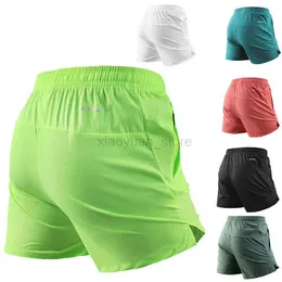 Shorts maschile Sport Shorts a secco rapido uomo Sport Sports Running Gym Beach Bottoms Women Fitness Fitness Pockets Shorts Pantaloni 240419 240419