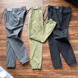 LU MEN JOGGER LONG PANTSライセンススポーツヨガ衣装フリースジムポケットスウェットパンツジョギングパンツメンズカジュアルエラスティックウエストフィットネス3色