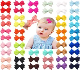 50 PCSLOT 25 färger i par Baby Girls Fulltyed Hair Pins Tiny 2quot Hair Bows Alligator Clips For Little Girls Spädbarn Tod6448629