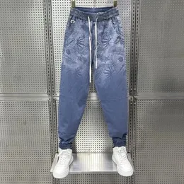 Pantaloni di denim uomo abbigliamento estate/autunno sottile stampa a gradiente di tendenza haren pantaloni per tutta la partita jeans di moda coreana hombre 240411