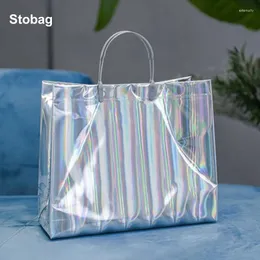 Сумки для хранения Stobag 25pcs Laser Shopping Tote Mag Сумка для пластиковых подарков Женская подарочная одежда